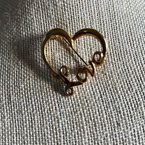Vintage unmarked “love” heart brooch